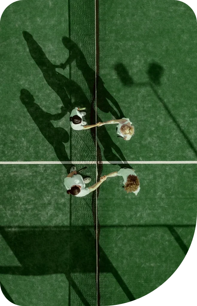 people playing paddle tennis outdoors